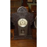 19th. C. ginger bread mantle clock.