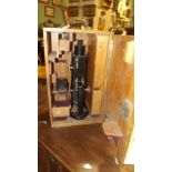 Victorian microscope in a case.