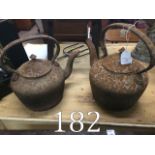 Two 19th. C. Cast iron kettles.