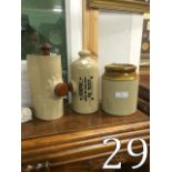 Two stoneware hot water bottles and a st