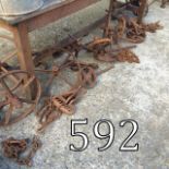 Collection of plough wheels and chains.