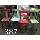 Three painted pine spindle backed chairs