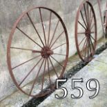 Pair of 19th. C. Metal cart wheels.