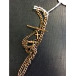 Gold muff chain with T -bar and 9ct Gold