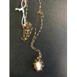 9ct. Gold necklace and pendent set with