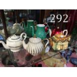 Collection of five teapots.