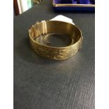 Rolled gold bracelet.
