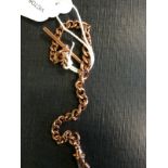 9ct. Rose gold bracelet with T - bar. 16