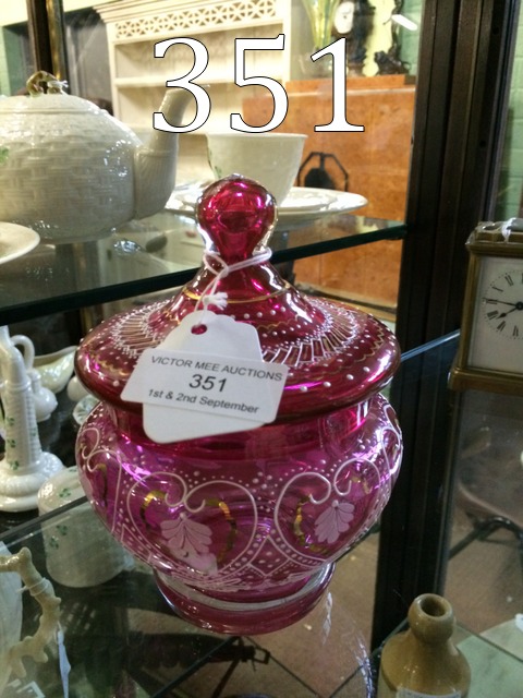 Ruby glass lidded jar.