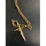 9ct. Gold chain and crucifix. 12 gram.