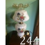 Electric table lamp with floral glass sh