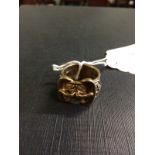 9ct. Gold gent's ring in the form of a b