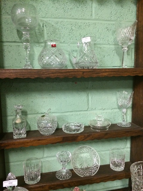 Three shelves of CAVAN crystal etc.