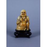 Scultura in avorio raff. "BUDDHA RIDENTE". Base in legno. Cina. XX secolo. Mis. Alt. cm. 9  ca.