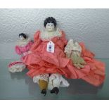 THREE PORCELAIN HEADED DOLLS WITH PORCEL