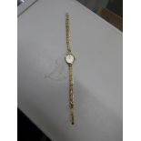 LADIES 9CT GOLD ACCURST WRIST WATCH ON A