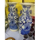 A PAIR OF CHINESE BLUE AND WHITE VASES WITH FLARED NECK DECORATED WITH ANIMALS AND BIRDS 58CM APROX