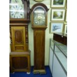 18TH CENTURY WALNUT LONGCASE CLOCK WITH A BRASS AND SILVER ARCHED DIAL WITH ENGRAVED DECORATION