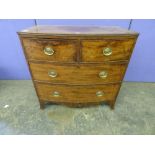 19TH CENTURY FOUR DRAWER BOW-FRONTED MAHOGANY CHEST OF DRAWERS HAVING OVAL BRASS HANDLES,