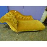 19TH CENTURY CHAISE LOUNGE UPHOLSTERED IN BUTTON BACK GOLD DRALON WITH MAHOGANY TURNED LEGS ON