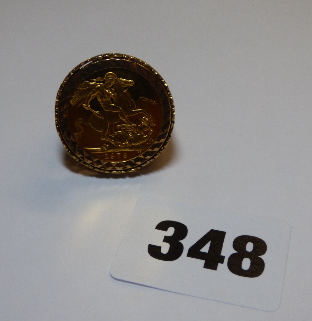 1978 FULL SOVEREIGN RING IN 9CT MOUNT SIZE S 13.