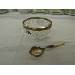 HM BIRMINGHAM SILVER RIMMED CUT GLASS BOWL AND A HM SHEFFIELD SILVER MOTHER OF PEARL HANDLED JAM