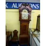 19TH CENTURY MAHOGANY LONG CASE CLOCK HAVING A BROKEN SWAN NECK PEDIMENT CENTRED WITH A CARVED