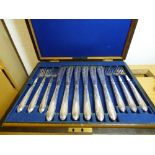 OAK CASED CANTEEN OF ENGRAVED QUALITY FISH CUTLERY SERVES TWELVE,