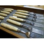 SET OF EARLY 19TH CENTURY PLATED CUTLERY WITH ENGRAVED BLADES AND CARVED IVORY HANDLES (SOME