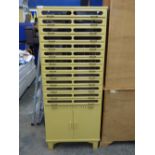 MID 20TH CENTURY HABERDASHERY CABINET WITH DROP FRONT DRAWERS WITH GLAZED PANELS