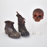 JACOBâ€™S LADDER, 1990 mixed media, pair of â€˜severed feetâ€™ army boots and skull, tallest