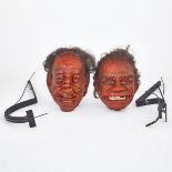 JACOBâ€™S LADDER, 1990 two mixed media â€˜shaking headâ€™ masks, each with articulated iron bracket,