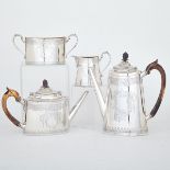 VICTORIAN SILVER TEA AND COFFEE SERVICE, ROBERT HARPER, LONDON, 1870 of tapering oval form, engraved