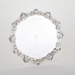 GEORGE II SILVER CIRCULAR SALVER, WILLIAM PEASTON, LONDON, 1753 with moulded shell and scroll border