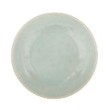 CELADON GLAZED PLATE, 18TH CENTURY 18世紀 粉青釉盤  Heavily potted with a pale celadon glaze throughout,