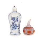 TWO SNUFF BOTTLES 青花及瑪瑙鼻煙壺兩只  Including a melon-imitation agate snuff bottle, and a blue and white