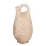 A BEIGE-GLAZED POTTERY FLASK, LIAO DYNASTY (907-1125) 遼 褐釉皮囊壺  The tall, pouch-shaped body tapers to