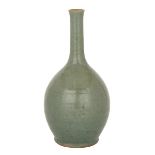 GREEN GLAZED KOREAN VASE, 18TH/19TH CENTURY 18/19世紀 韓國 仿龍泉長頸瓶  Finely potted with bulbous body and