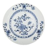 NANKING CARGO BLUE AND WHITE PLATE, CIRCA 1750 約1750年 南京號沈船青花瓷盤  The cavetto painted with a blooming