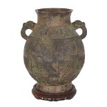 ARCHAIC BRONZE HU VASE 獸耳鳳紋青銅壺  Finely cast with two mythical beast tug handles and a geometric