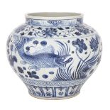 A YUAN-STYLE BLUE AND WHITE ‘FISH’ JAR 仿元青花魚藻紋罐  Standing on a broad, low foot and rising to a