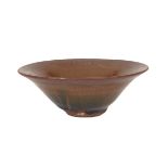 JIANYAO STYLE BOWL 建窯小碗  Of rich hues of maroon and deep yellow, punctuated by a rich blue