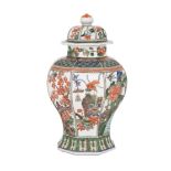 WUCAI BALUSTER VASE WITH COVER 五彩蓋罐  Of octagonal baluster form, with each of the eight panels