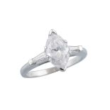 PLATINUM RINGset with a marquis cut diamond (approx. 1.59ct.) flanked by 2 small baguette cut