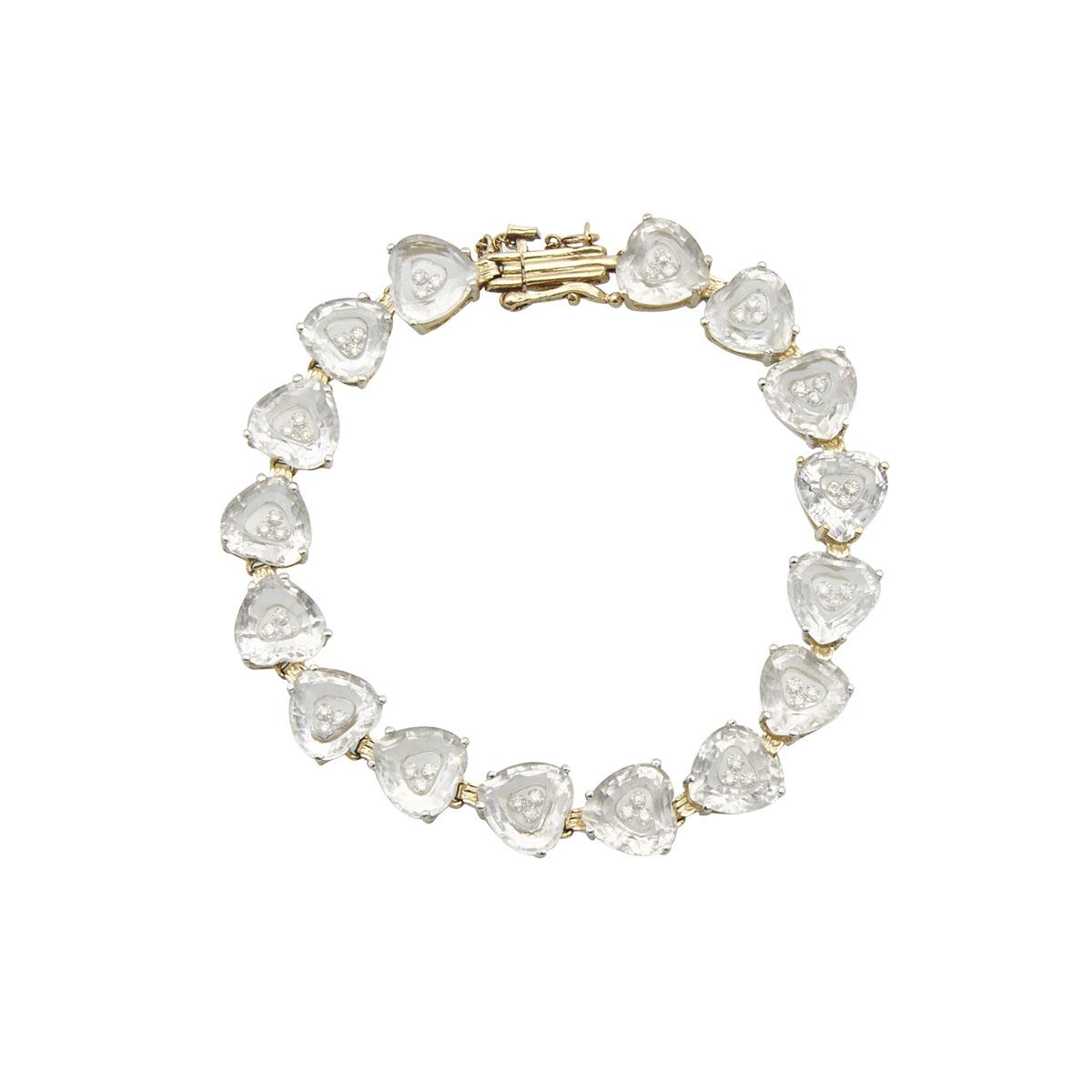 14K YELLOW GOLD BRACELETset with 16 hollowed heart cut white topaz, each containing 3 small roving