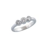 18K WHITE GOLD RINGinvisibly set with 3 brilliant cut diamonds (approx. 0.72ct.t.w.), size 6 1/2,