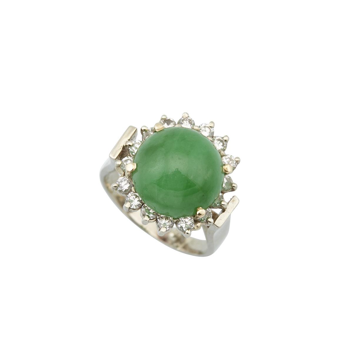 14K WHITE GOLD RINGset with a circular jadeite cabochon (12.6mm) encircled by 16 brilliant cut