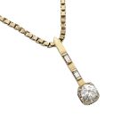 14K YELLOW GOLD AND WHITE GOLD PENDANTset with a brilliant cut diamond (approx. 0.77ct.) and 2 small
