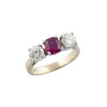 BIRKS 14K YELLOW GOLD AND PLATINUM RINGset with a modified oval cut ruby (approx. 0.90ct.) flanked