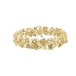 14K YELLOW GOLD BRACELETformed in a foliate motiflength 7.25" — 18.4 cm., 43.3 grams